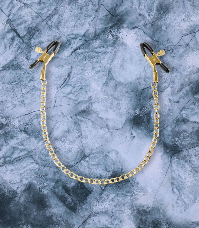 PINZAS PARA PEZONES ORO Y NEGRO